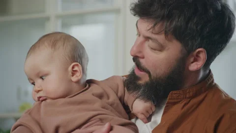 Young father talking to his small son Stockbeeldmateriaal 199249126