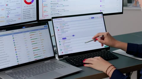 Young Female Auditor Using Automated Software Stock Footage 338170484