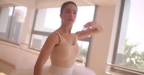 Young female ballet dancer practising classical ballet Stock Footage 80273158