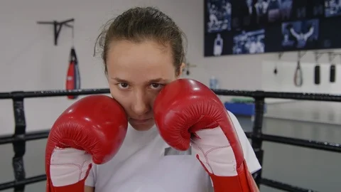 Young Female Boxer Posing for Camera on Ring Stock Footage 119089518