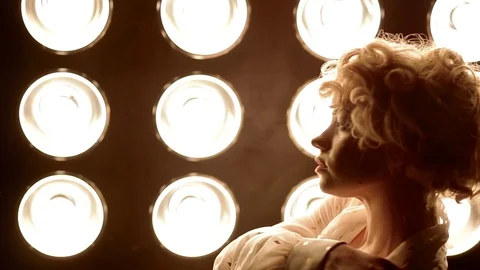 Young female dancer dancing in front of studio light Stock Footage 89800236