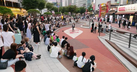 Young female dancer from group performs solo dance in front of crowd, slowmo Stock Footage 292921179