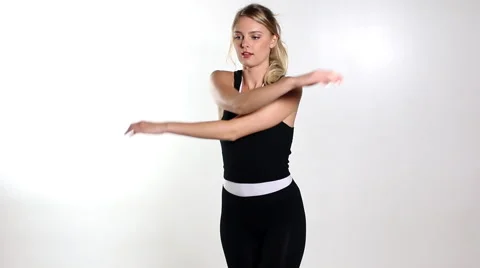 Young female dancer warming up in studio Stock Footage 46145063