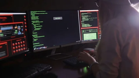 Young female in dark inputting data, computer codes, breaking security system Stock Footage 71270472