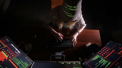 Young female in dark inputting data, computer codes, breaking security system Stock Footage 71271113