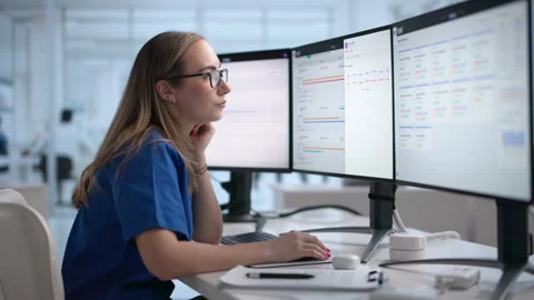 Young Female Doctor Using Computer Stock Footage 339896134