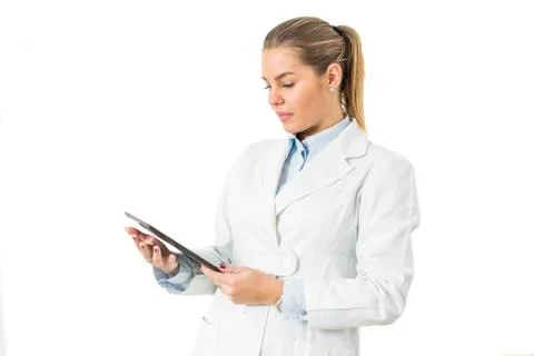 Young female doctor using digital tablet Stock Photos