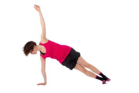 Young female doing exercise Foto stock