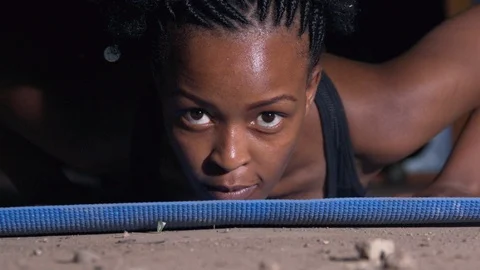 Young female doing push ups in the hall Stock-Footage 115790779