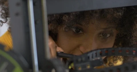 Young Female Engineer Fixing Broken Machine with Tools Stock Footage 121772156