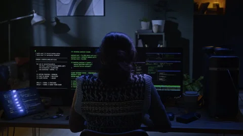 Young Female Hacker Coding on Desktop Computer during Night in Apartment Stock Footage 328250933
