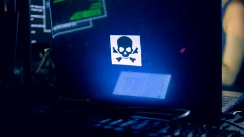 Young female hacker is operating a computer Stock Footage 101572358