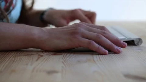 Young female hands typing computer keyboard mouse closeup Stock Footage 79503379