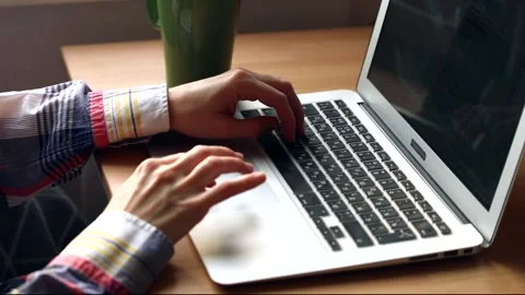Young female hands typing text on laptop keyboard chatting online. Internet comm Video stock 144170064