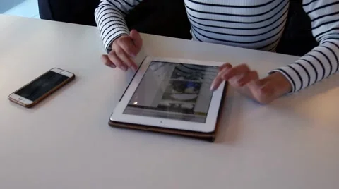 Young Female hands is  using tablet PC in cafe Stock Footage 63169957