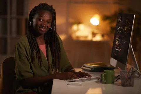 Young Female IT Developer Writing Code Stock Photos