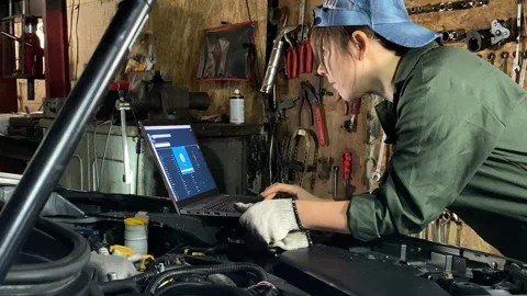 Young Female Mechanic Prepares for Computer Car Diagnostics Stock Footage 255737187