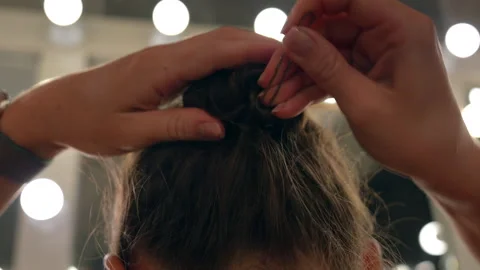 Young female model is doing her makeup in the dressing room. Stock Footage 281232803