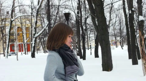 Young female model posing in winter park Stock Footage 5186807