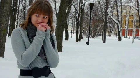 Young female model posing in winter park Stock Footage 7132906