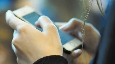 Young female model use a mobile phone to check a city map and check message box 스톡 동영상 69077574