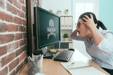 Young female office worker using computer working 写真素材