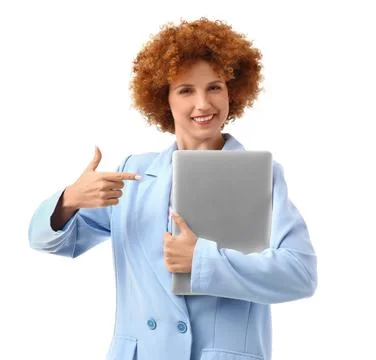 Young female programmer pointing at laptop on white background Foto stock
