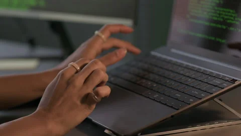 Young Female Programmer Typing Program Code on Laptop in Office at Night Stock Footage 292621602