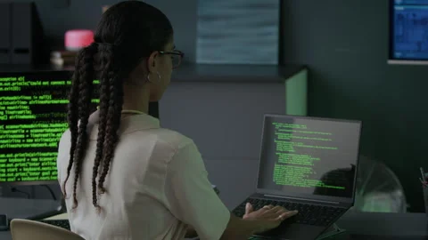 Young Female Programmer Working with Program Coding in Night Office Stock Footage 292622329