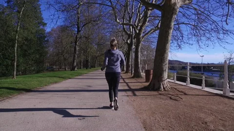 Young Female Runner in Park Video stock 145259322