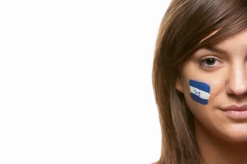 Young Female Sports Fan With Honduras Flag Painted On Face Stock Photos