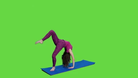 Young female stands on mat doing bridge pose and returning to standing position Video stock 244859378