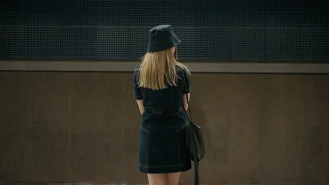 Young female student waiting for train on subway Stock Footage 179112083