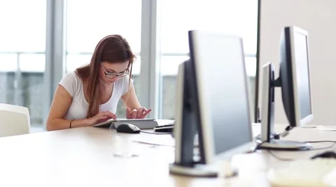 Young female student working with her computer Stock Footage 50348905