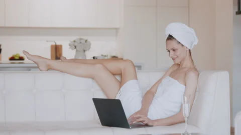 Young female using computer enjoy day off 動画素材 168322812