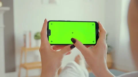 Young Female Using Smart Phone Sitting On Sofa At Home. Stock Footage 152231776
