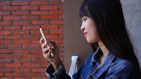 Young female using smartphone Video stock 87443238