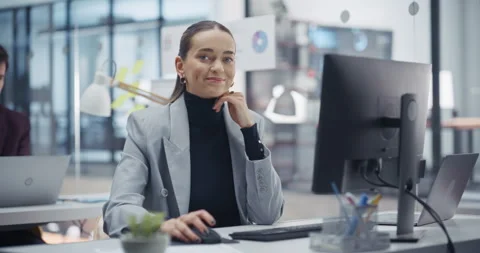 Young Female Working on Computer in Office Video stock 318065338