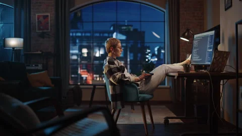 Young Female Writing Code on Computer in Loft Apartment 库存影片 170397092
