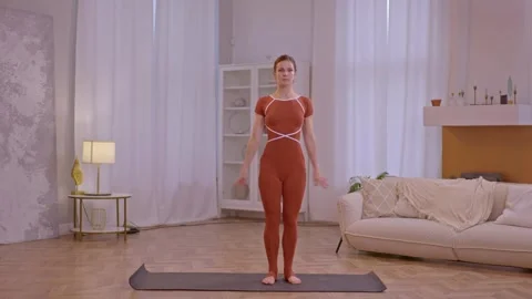 Young fit athletic trainer doing pilates and fitness exercises Stock Footage 255862606