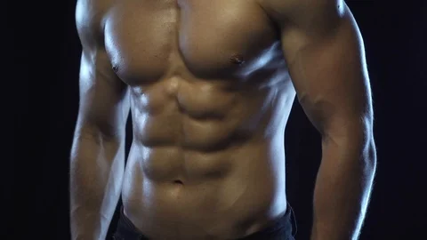 Young fit guy shows abs, loop Stock Footage 108952963