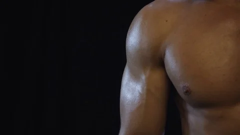 Young fit guy shows biceps Stock Footage 109501105