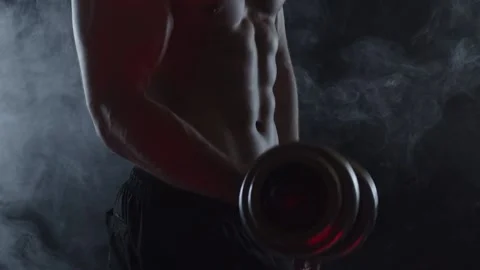 Young fit man on black background Stock Footage 137211587