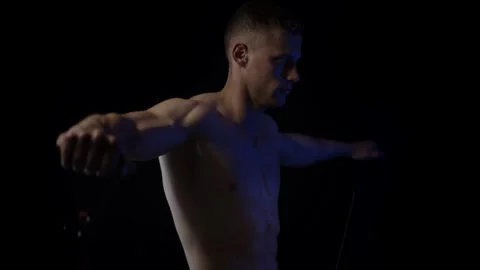 Young fit man doing lateral raise. Loop Video stock 137211284
