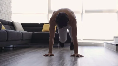 Young Fit Man Working Out at Home Mountain Climber Stock Footage 117486782