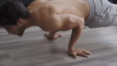Young Fit Man Working Out at Home Reverse Hand Pushups Stock Footage 117488168