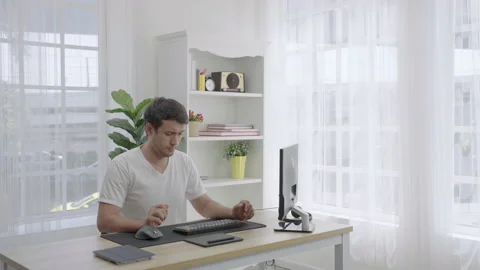 Young freelancer prepares to work at home on a computer. Stock Footage 171045628