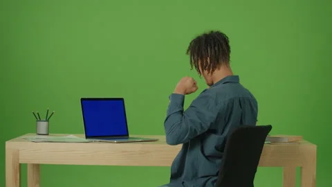 Young Freelancer Student Typing on Blue Screen Laptop Working in Internet Stock Footage 219757417