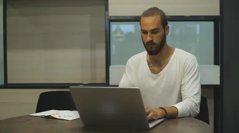 Young freelancer working on a laptop Stock Footage 67095461