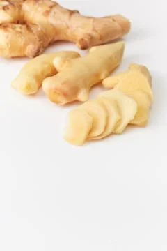 Young fresh cut ginger root on white background Stock Photos